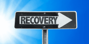 road to recovery sign